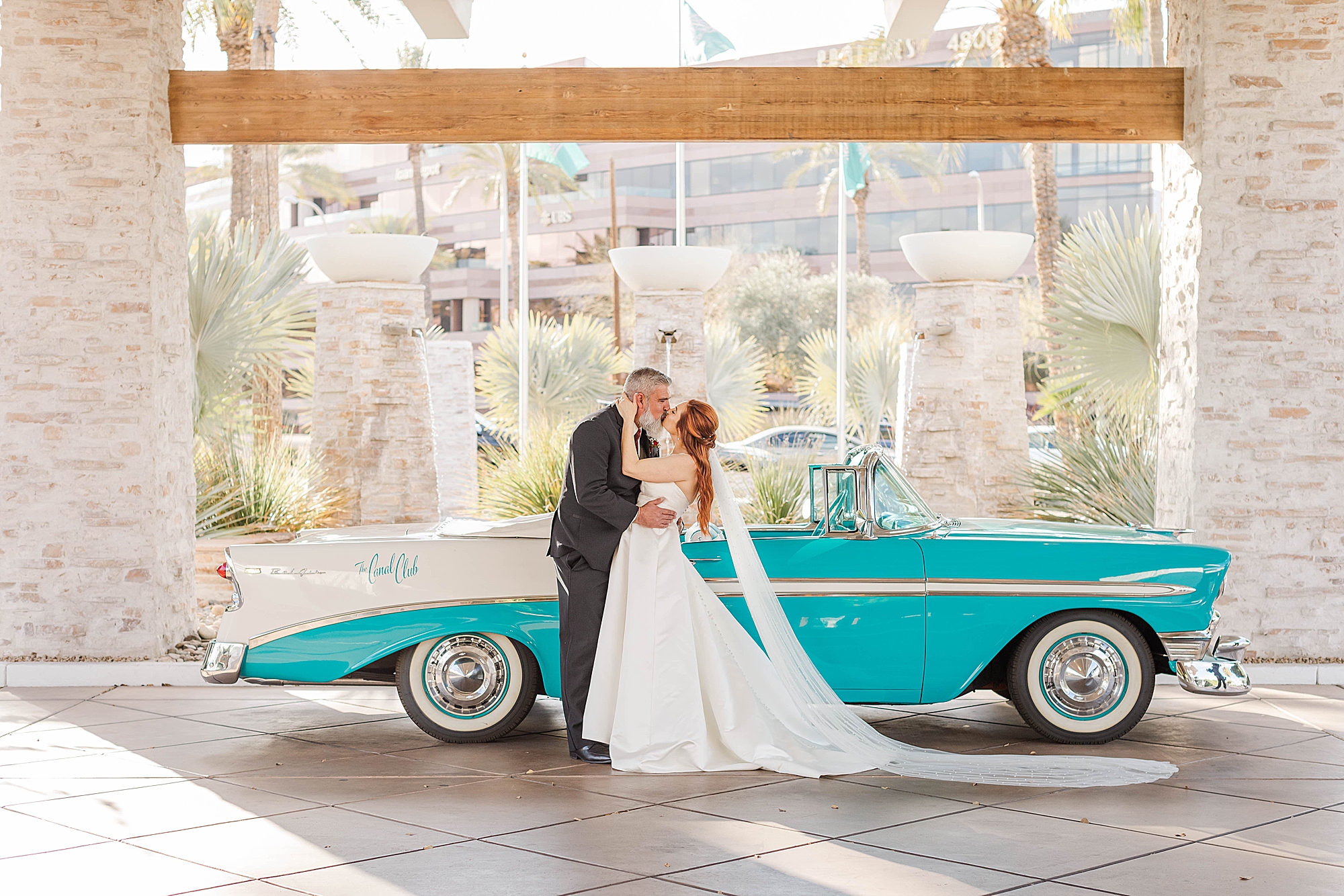 The Scott Resort and Spa Wedding bride and groom in front of classic car